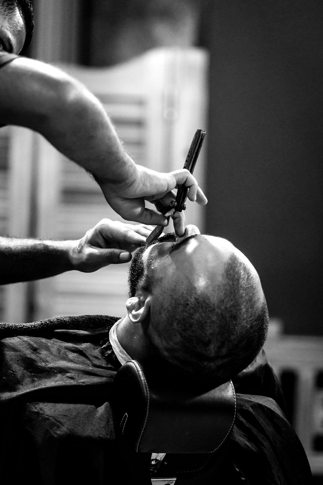 Straight razor detail work on a close crop