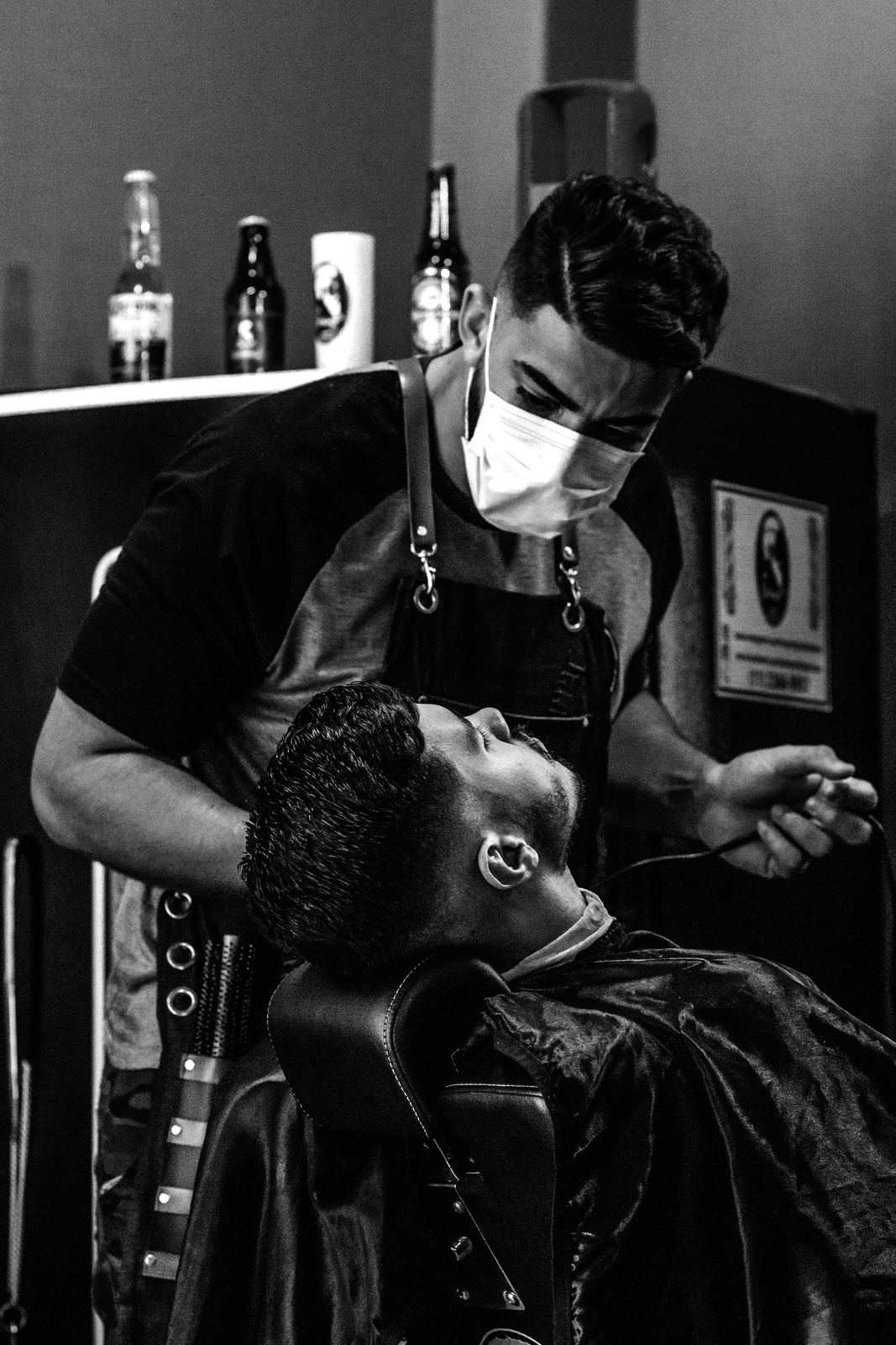 Barber lining up a beard