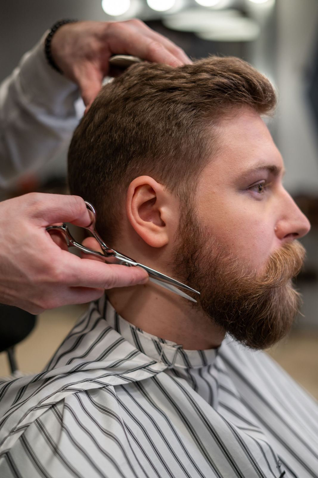 Scissor work through a full beard