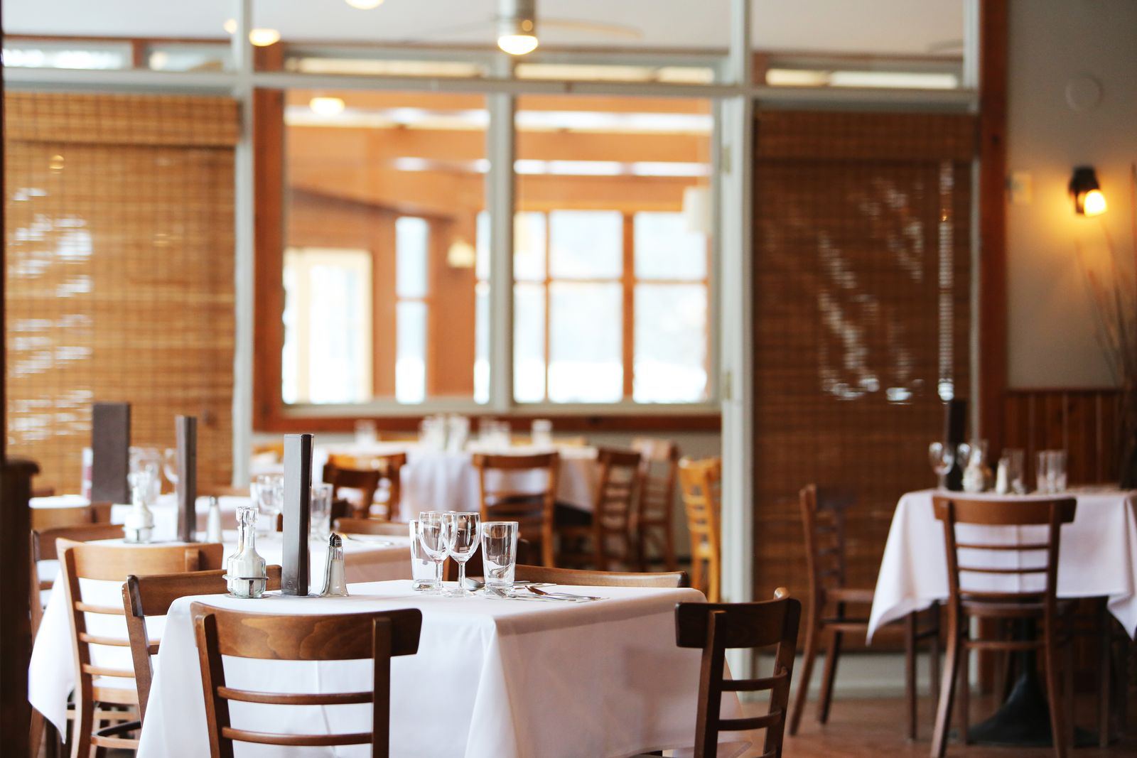 Restaurant dining room with set tables